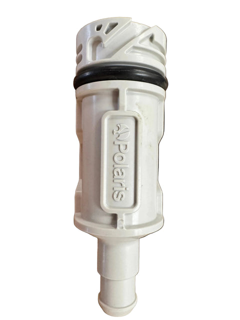 A white plastic Polars water filter cartridge with a black rubber O-ring, shown vertically on a textured brown surface.