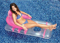 Swimline Deluxe Lounge Chair Pool Float 9041 floating in pool with woman relaxing